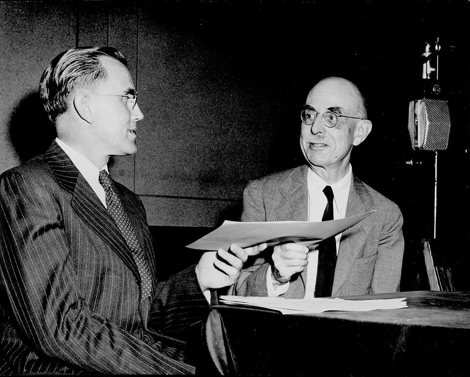 George Lynn Cross (left) interviewing Roy Temple House