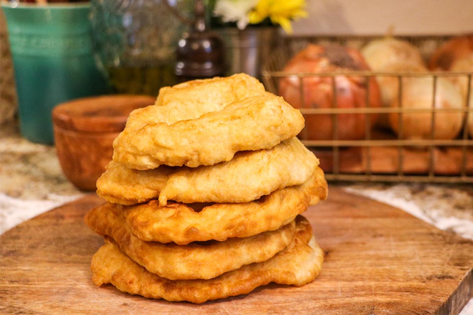 A photograph of a stack of frybread