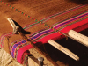 A photograph of a Native weave on a wooden loom