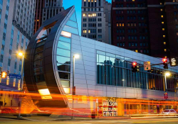 An exterior shot of the August Wilson African American Cultural Center at dusk